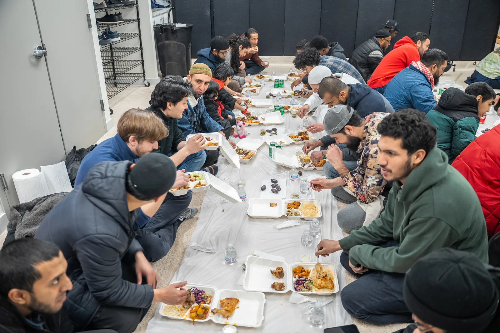 Community members sharing an iftar meal at MAS Staten Island in March 2024